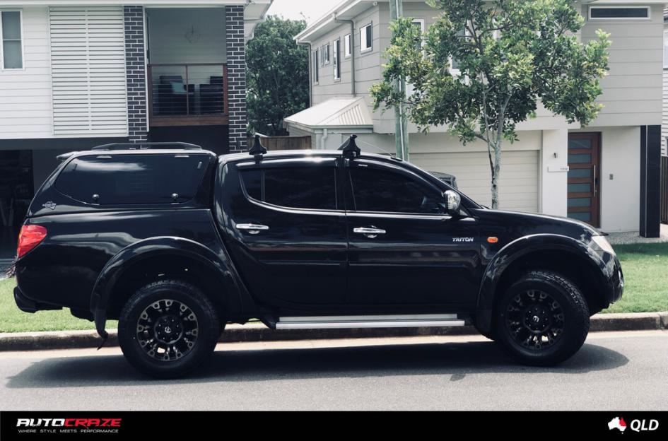 MITSUBISHI TRITON VAPOR BLACK MACHINED WITH DARK TINT